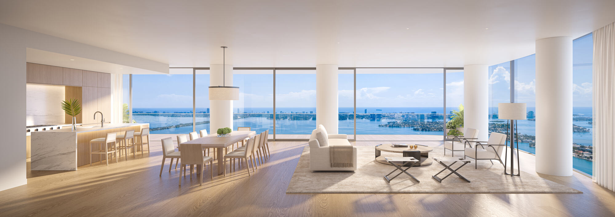 Great room, kitchen and dining with full bay glass, EDITION Residences Miami Edgewater