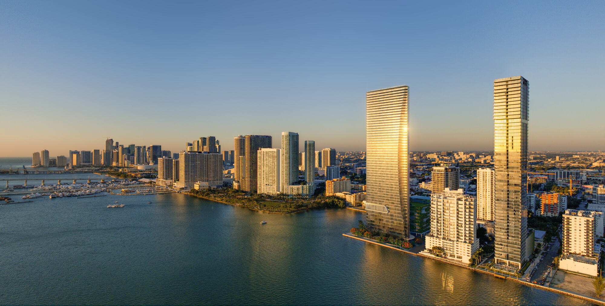 Aerial dusk view of EDITION Residences, Miami Edgewater, on Biscayne Bay